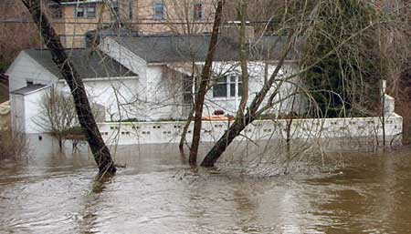 Nor’eastern flooding. flooded home. Farmington River, Simsbury CT