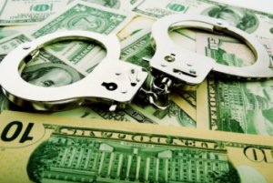 corruption handcuffs